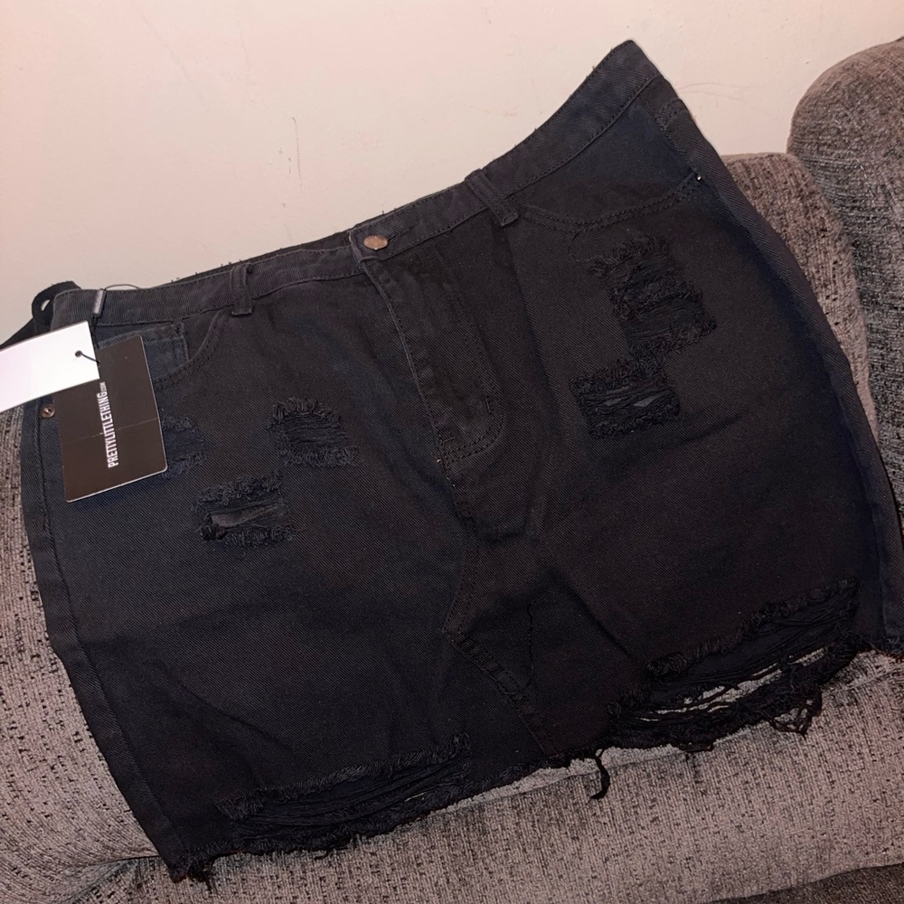 Plus black distressed rip denim mini skirt
